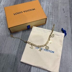 Louis Vuitton Gold Charm Bracelet with Monogram Charms